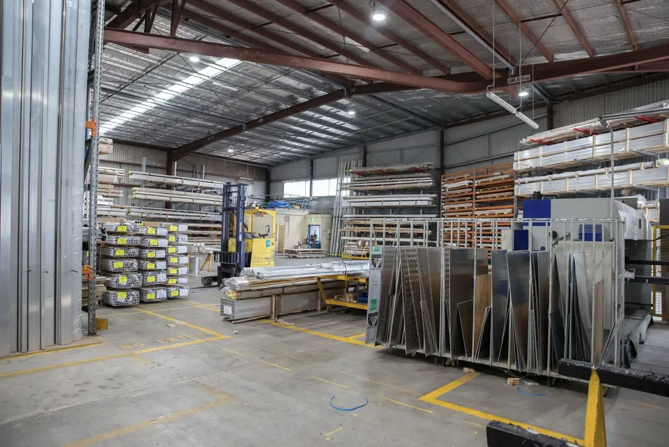 Spacious Industrial Warehouse Interior with Storage Racks