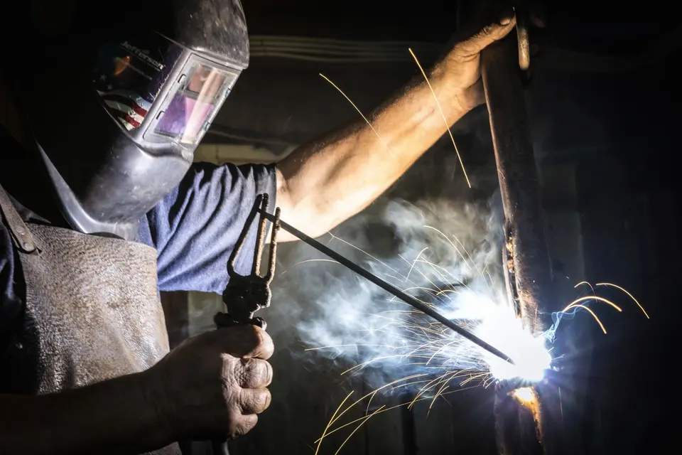 A Man Doing Welding 