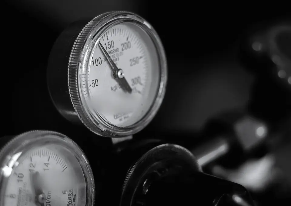 Close-Up of Industrial Pressure Gauge in Monochrome