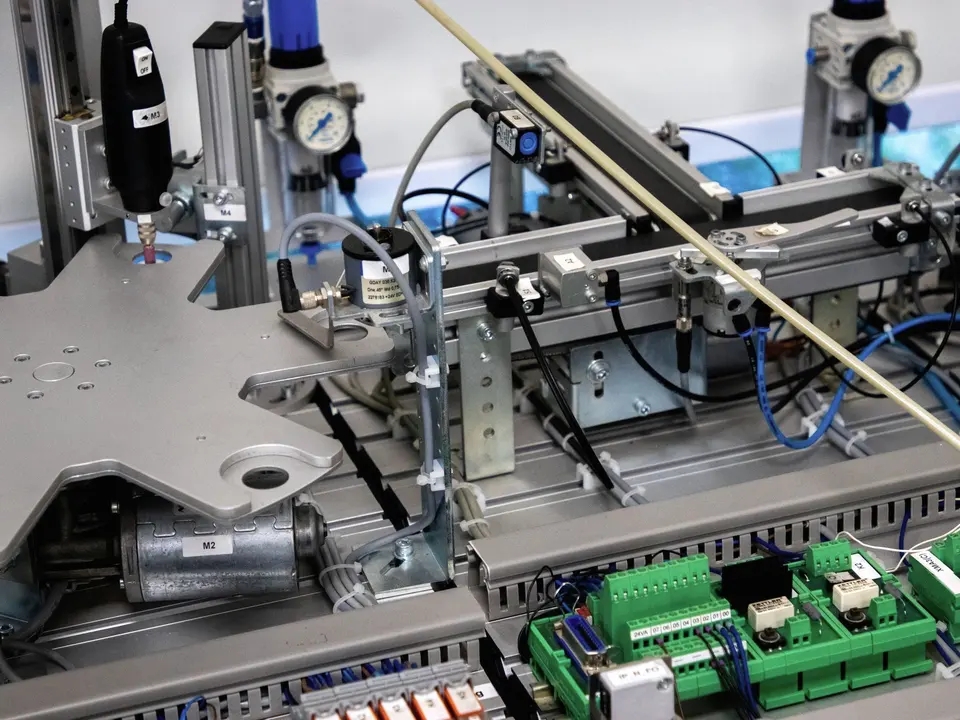 A machine with wires and electronics on it